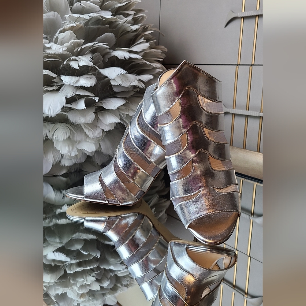 Daya by Zendaya silver sandals